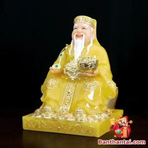 Tượng Thần Tài phúc hậu cầm thỏi vàng.