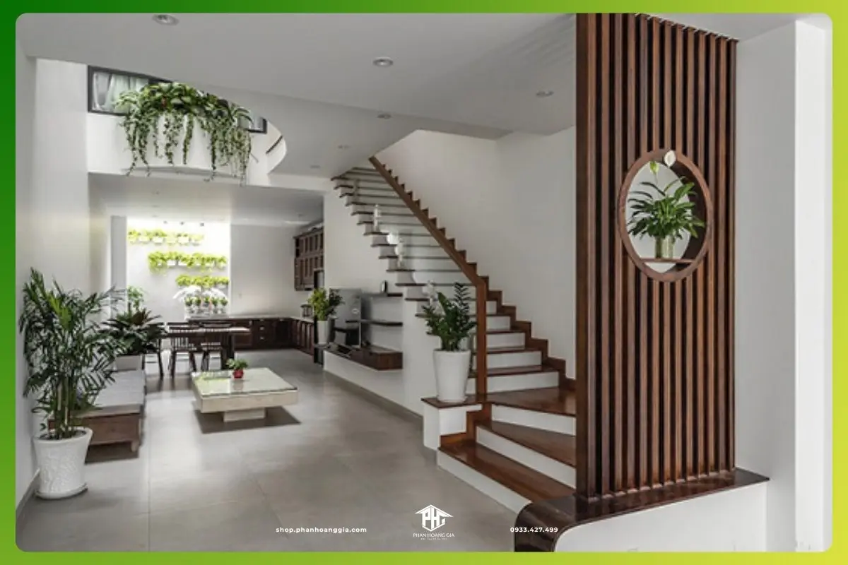 Nâng Tầm Vị Thế: Khám Phá Ý Nghĩa Phong Thủy Cầu Thang Chuẩn Mực 5 Cầu thang hóa giải phong thủy bằng bình phong cây xanh