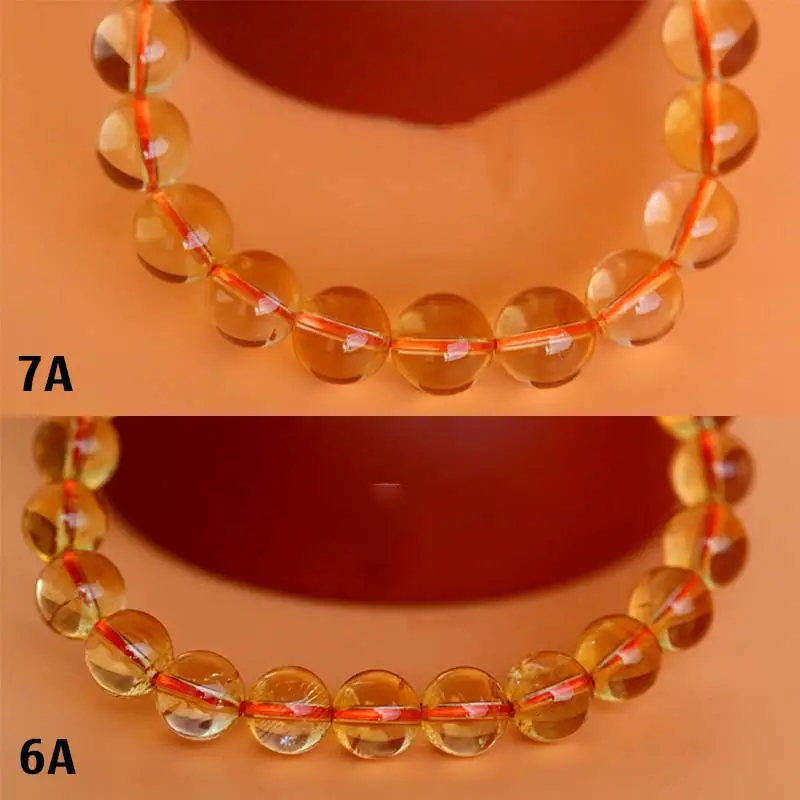 Hướng Dẫn Toàn Diện Về Vòng Pha Lê Thạch Anh Hợp Ai 6 Vòng tay thạch anh vàng rực rỡ trên cổ tay phụ nữ.