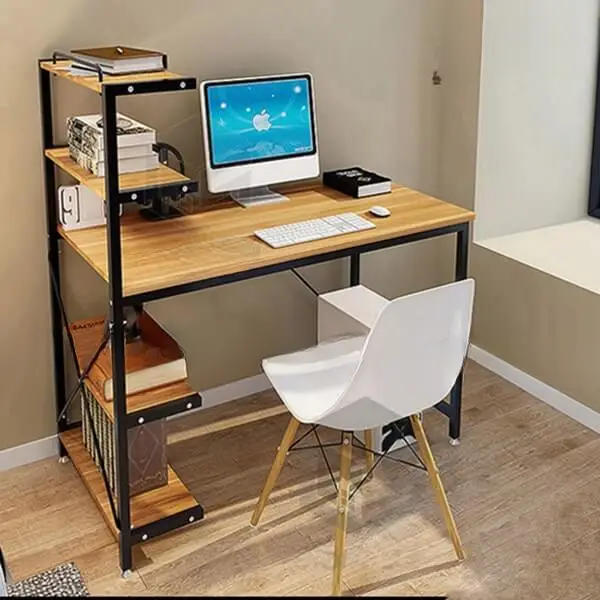 Khám Phá Ý Nghĩa Cây Phát Tài Bàn Làm Việc Chuẩn Phong Thủy 6 Bàn làm việc gọn gàng: Laptop, sách, cây.