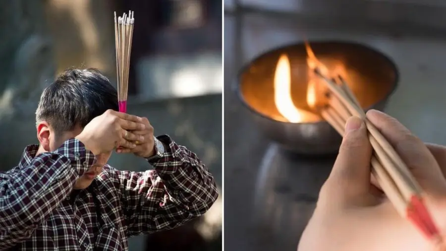 Nằm Mơ Thấy Bốc Mộ Thấy Quan Tài Rỗng: Giải Mã Điềm Báo & An Tâm Hóa Giải 6 Bàn tay thắp hương khấn vái bàn thờ.