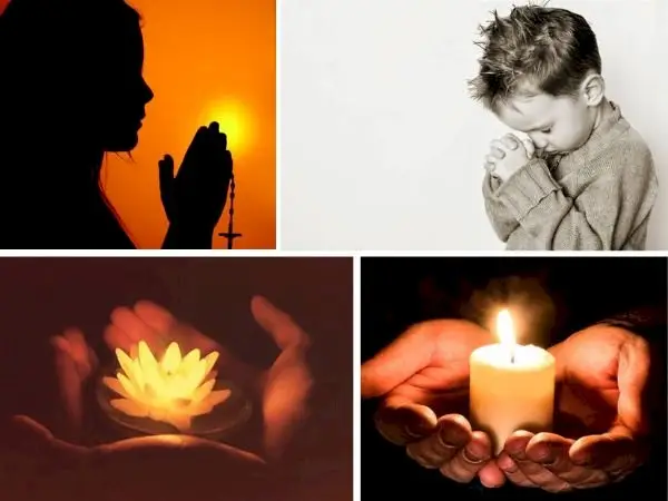 Bàn tay chắp cầu nguyện ánh sáng.