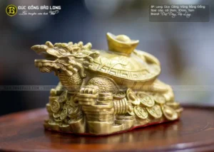 Long Quy phong thủy cõng bọc tiền vàng