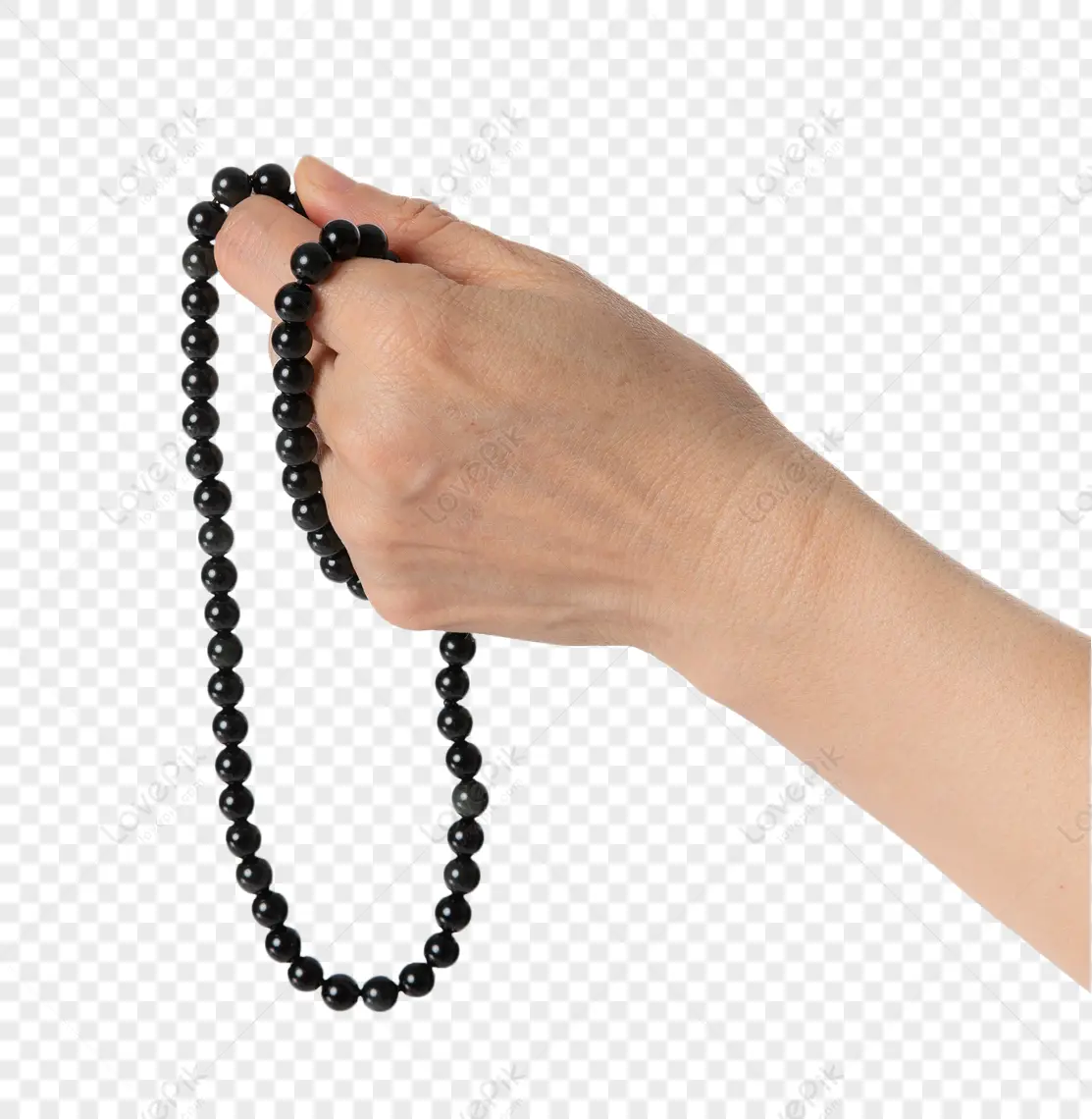 Bàn tay cầm chuỗi hạt cầu nguyện an lành.