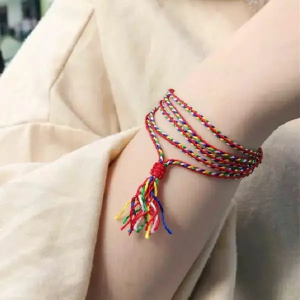 Vòng Chỉ Đỏ 9 Nút Ý Nghĩa: Khai Mở Bình An và May Mắn 4 Vòng chỉ đỏ Phật giáo Tây Tạng