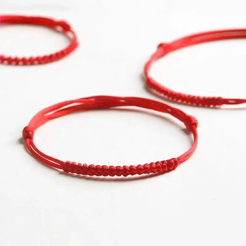 Giải Mã Sức Mạnh Của Vòng Chỉ Đỏ Thắt Nút Phong Thủy Chân Truyền 7 Nút thắt tinh xảo vòng chỉ đỏ.