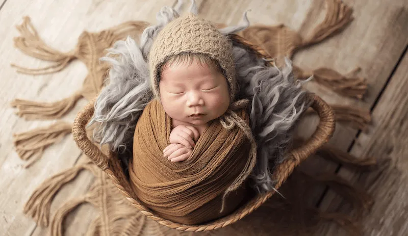 Hình ảnh em bé với tên Thiên Ân, tượng trưng cho ý nghĩa trời ban