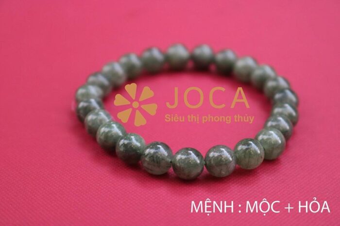 Vòng đeo tay bằng đá thạch anh tóc vàng với các sợi rutile bên trong