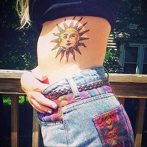 Hình xăm mặt trời hợp mệnh Thổ 1990