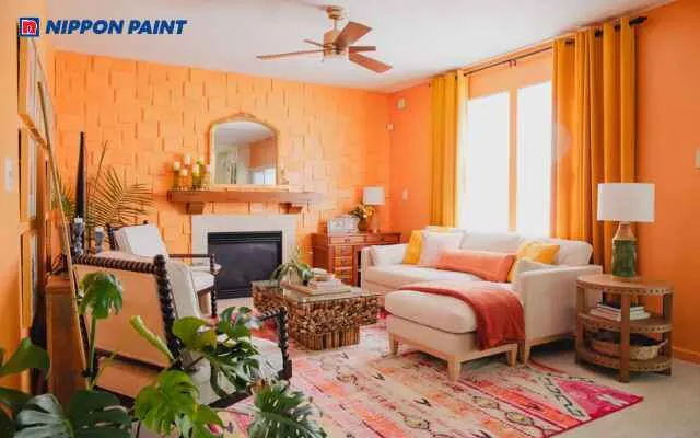 Phòng khách hướng Bắc nên chọn tông đỏ cam để mang lại sự ấm áp và sinh khí