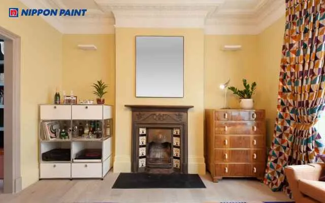 Mẫu 8: Màu vàng nhạt tạo cảm giác ấm áp và tươi tắn cho phòng khách