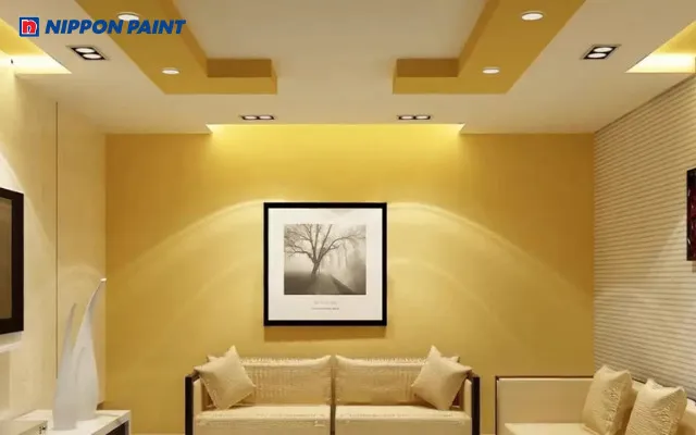 Thiết kế phòng khách sử dụng tông màu vàng đất tạo nên không gian sang trọng và đón tài lộc