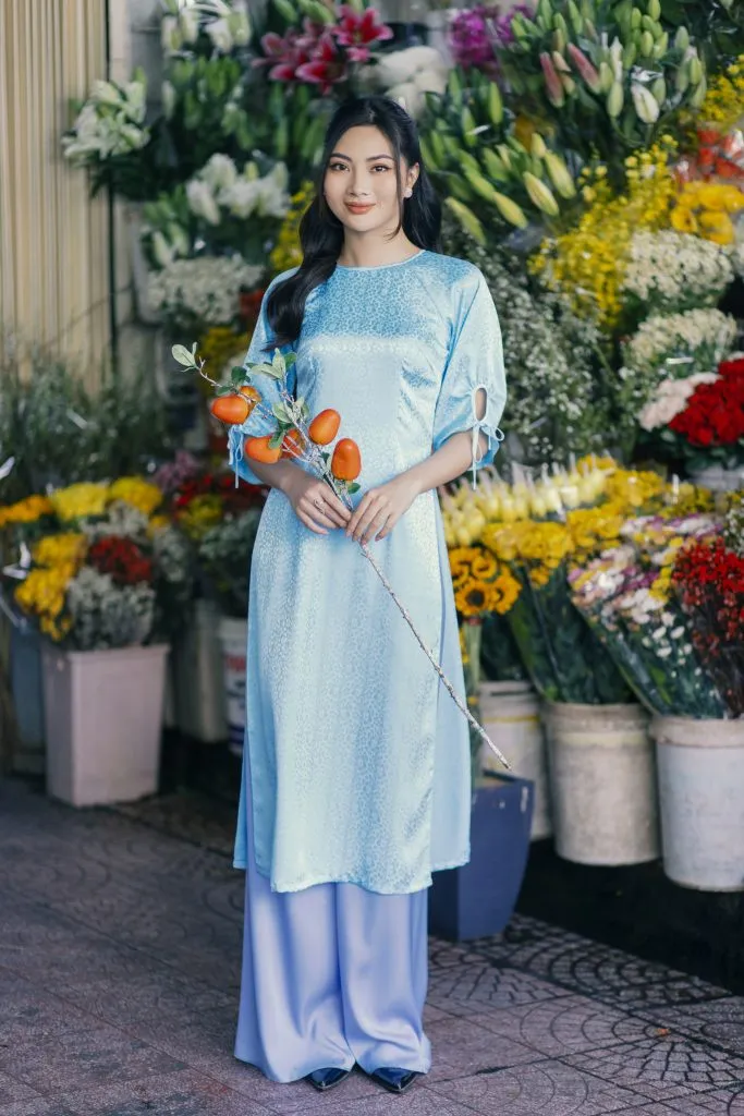 Vải gấm xanh họa tiết vân ngọc